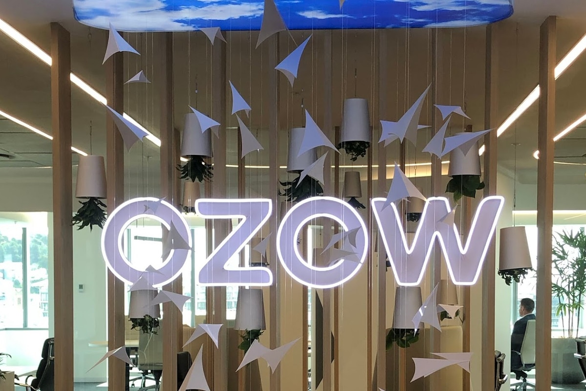 A photo showing the entryway of Ozow's offices on the 10th floor of the grandiose Portside Building on Buitengracht Street in Cape Town. Its logo is prominently displayed.